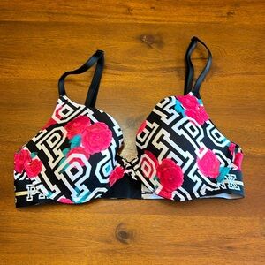 Pink lightly lined underwire bra with thick, comfortable, elastic band.